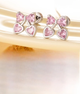 Detail of pink cherry earrings with dimensions 0.8x6mm and polished titanium steel stem