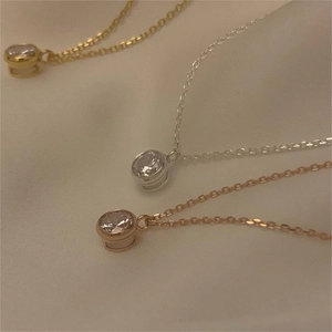 Detailed close-up of 925 silver cubic zirconia pendant in gold silver and rose gold