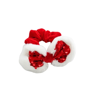 Red sequin bow hair scrunchie with white faux fur trim for Christmas festive hair styling