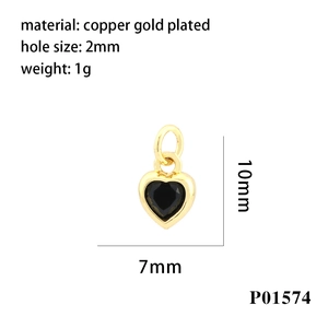 Detail of 10mm gold heart charm with black gemstone inlay and product specifications