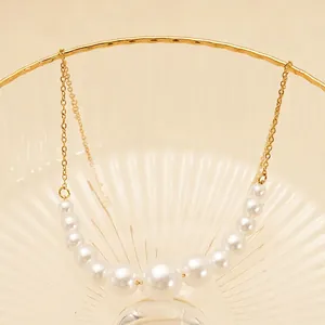 Elegant 18K gold plated necklace with 11 gradient pearls on a minimalist chain