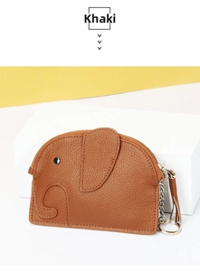 Detail of khaki elephant-shaped leather coin purse with metal zipper and key ring