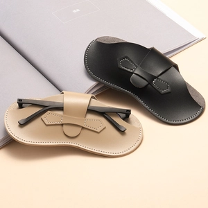 Étuis à lunettes de soleil portables en cuir noir et beige avec lanière de fermeture