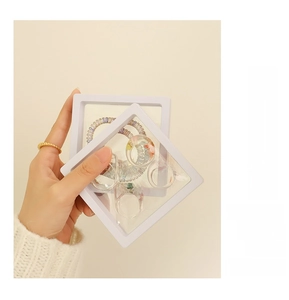 White floating frame display box with PE film showing ring and jewelry storage use