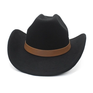 Close-up of black felt cowboy hat with a brown leather band and curved brim detail