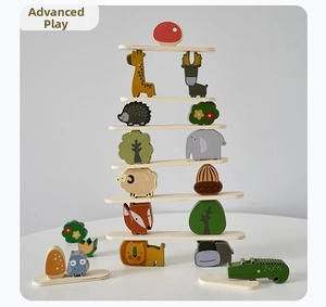Detail showing advanced tower stacking of colorful wooden animal blocks and boards