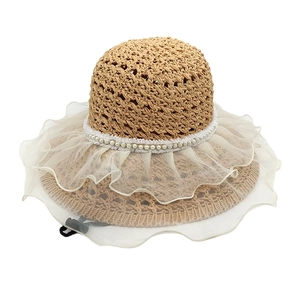 Women's woven straw sun hat with white lace ruffles and elegant pearl decorative band
