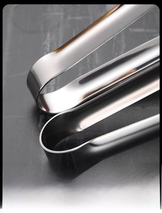 Macro shot of 304 stainless steel food clip with polished one-piece molded structure