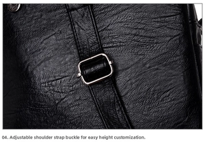 Detail of adjustable silver buckle on black lychee grain leather shoulder strap