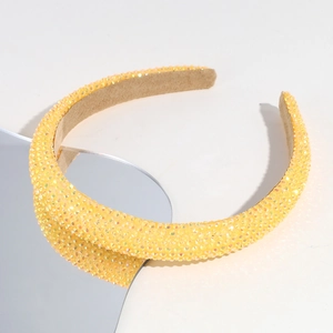 Detail of yellow Baroque headband featuring densely inlaid rhinestones with anti-slip lining