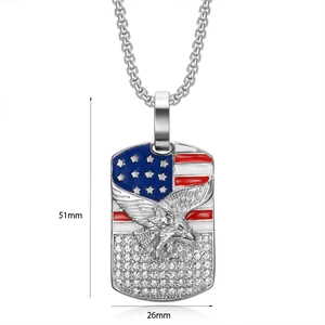 Detail of hip hop dog tag necklace with eagle, US flag enamel, and crystals