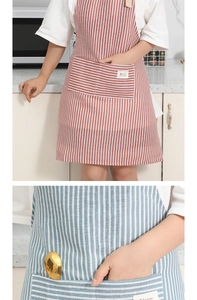 Close-up of stripes and large front pocket on high-density waterproof kitchen apron
