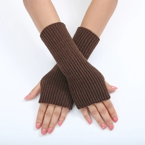 Close-up of brown striped knitted fingerless gloves for women with arm warmer design
