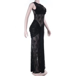 Close-up of elegant black lace pattern and slim fit design on a long sleeveless dress