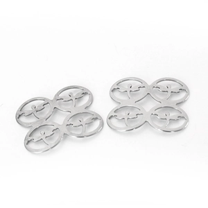 Close-up of silver stainless steel dragonfly charm pendants for DIY jewelry making
