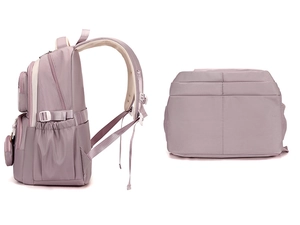 Detail of light purple nylon backpack showing padded straps and multi-pocket design