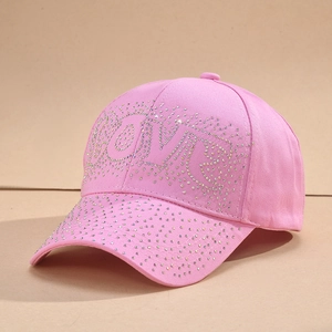 Pink baseball cap with silver rhinestone LOVE embroidery and a classic curved brim