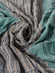 Macro shot of thin pinstripe scarf fabric in navy blue and beige breathable material