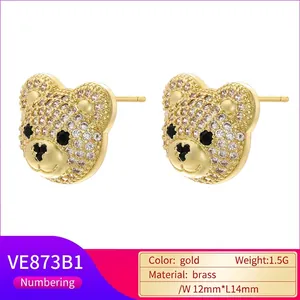 Golden hip hop bear stud earrings with shiny crystals and brass material for women