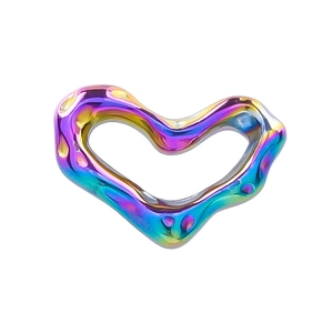 Macro view of a heart-shaped 304 stainless steel pendant with rainbow metallic finish