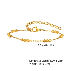 Detail of golden bead chain bracelet showing 16-21cm length and 0.3cm bead diameter