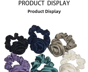 Detail display of six satin rose flower scrunchies in various colors on white background