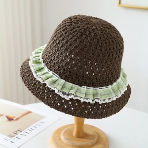 Women's dark brown woven straw hat with green plaid trim and lace edge for beach sun protection