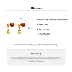 Spécifications détaillées des boucles d'oreilles gourde avec dimensions en alliage et perle