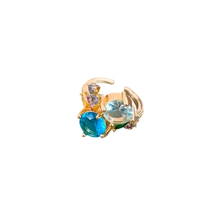 Elegant gold geometric hollow ring set with sparkling colorful zircon gemstones