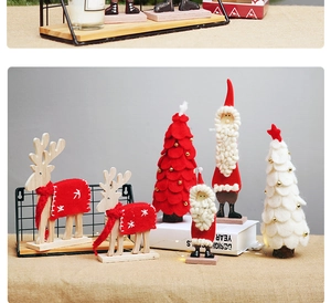 Macro detail of felt reindeer and Santa Claus ornaments on wooden bases for Xmas decor