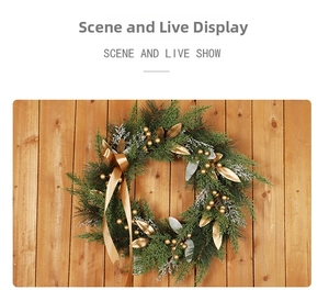 Detail of Christmas wreath with golden bow and berries against warm wood wall