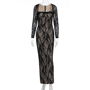 Close-up of black lace fabric and square neckline detail on this elegant evening dress