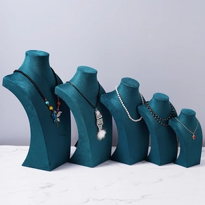 Green velvet bust necklace displays in five sizes for jewelry showroom counter storage