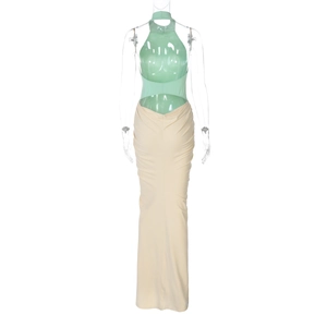 Back view of backless halter maxi dress with green top and beige skirt contrast