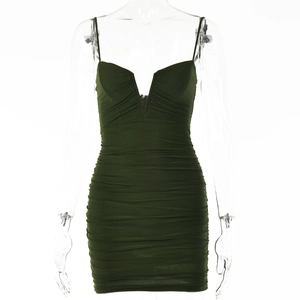 Detail of dark green bodycon dress featuring pleated texture and sexy low-cut V-neckline