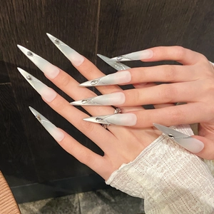 Extra long stiletto press-on nails with silver cat-eye gradient and rhinestone accents