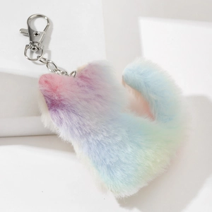 Close-up of fluffy rainbow cat plush keychain with silver lobster clasp on white background