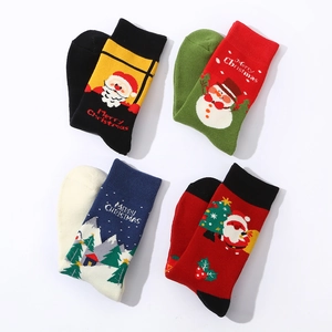 Thick winter terry Christmas socks with Santa and snowman patterns in festive colors