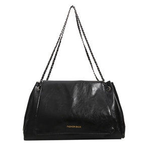 Retro black PU leather chain shoulder bag with gold 'FASHION BAGS' lettering on white background