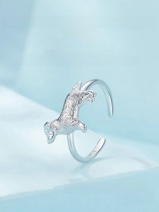 Detailed shot of S925 sterling silver ring showing the Golden Retriever puppy relief