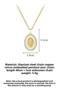 Detail of gold titanium steel necklace with Madonna pendant and shimmering shell inlay