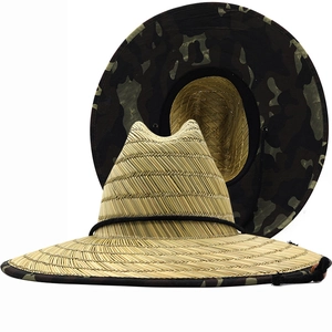 Wide brim straw hat with woodland camouflage underside and adjustable chin strap