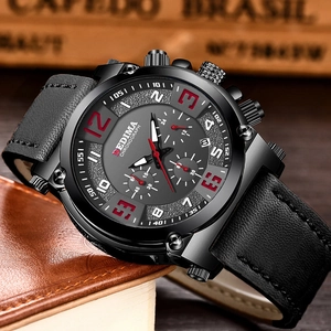 Men's chronograph watch with black leather strap and steel case on a leather background