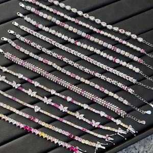 Close-up of S925 sterling silver tennis bracelets with colorful zircon butterfly charms