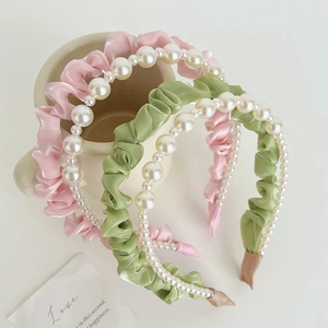 Elegant mesh gauze and pearl headbands in pink, green, and white for a chic French style