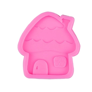 Close-up of a pink silicone mushroom house mold for cake decoration and DIY crafts