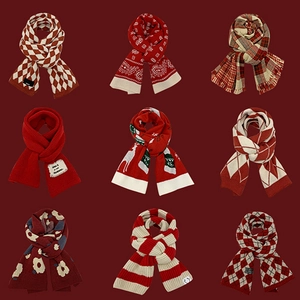 Grid display of assorted red and beige knit scarves with plaid, polka dot, and festive patterns
