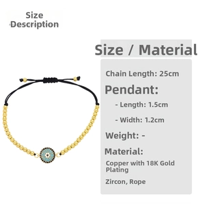 Detailed view of evil eye charm bracelet with 18K gold plated copper and blue zircon