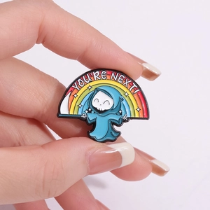Cartoon grim reaper rainbow enamel pin badge with You're Next text for backpacks
