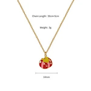 Detail of gold titanium necklace with red enamel pendant showing 39+5cm chain length